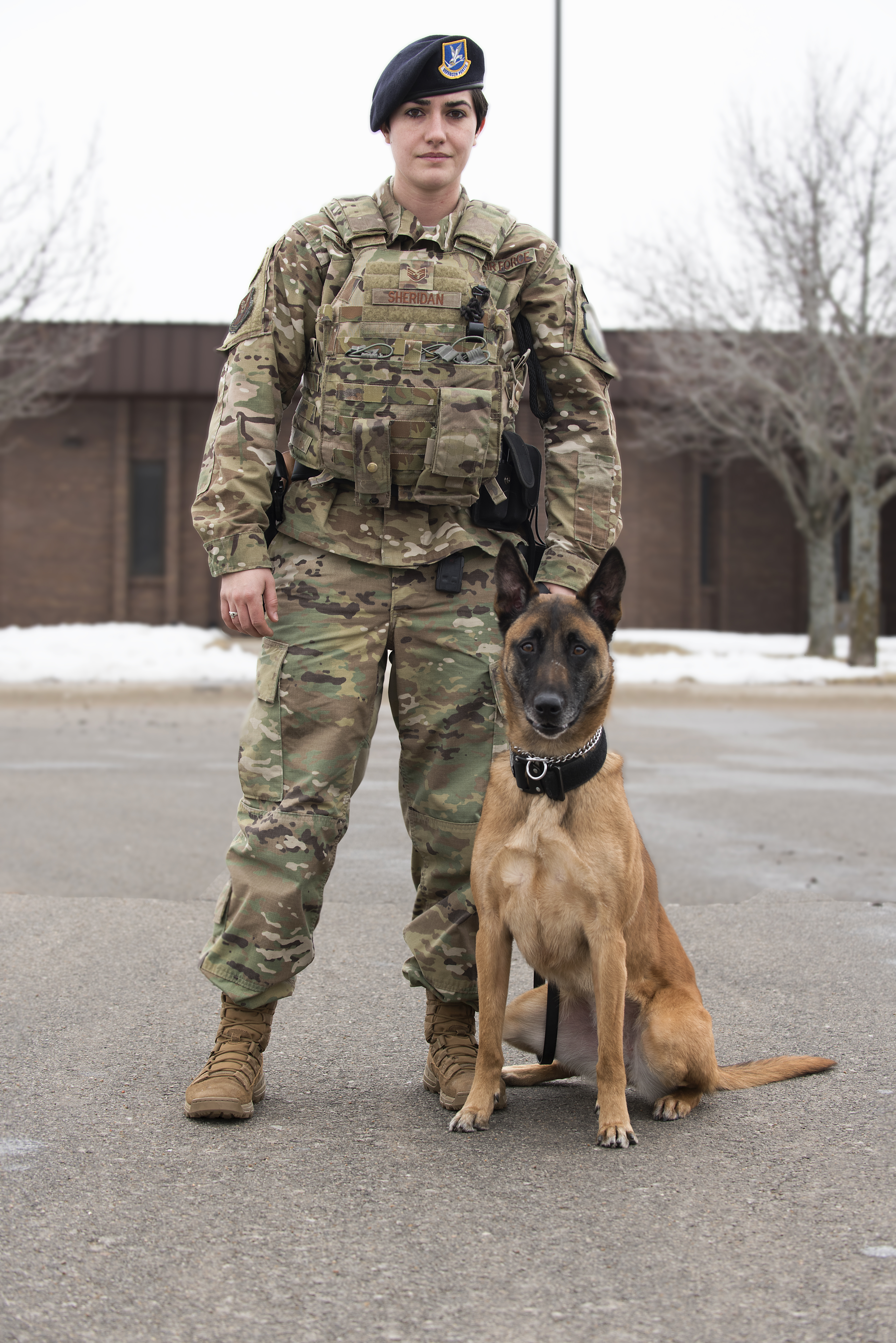 Staff Sgt. Nicolette Sheridan, the only female military working dog (MWD) handler stationed at Whiteman AFB, is partnered with 4-year-old MWD, Gucci. Together, they help ensure the safety of the base.